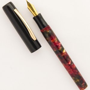 Custom Duo: Ebonite and Red Chunk Resin