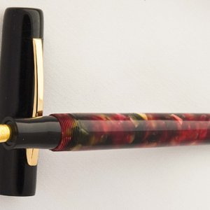 Custom Duo: Ebonite and Red Chunk Resin