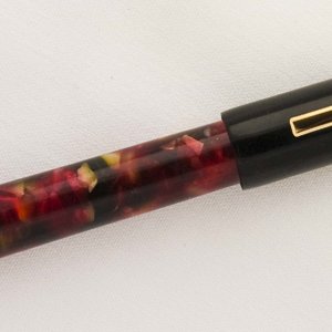 Custom Duo: Ebonite and Red Chunk Resin