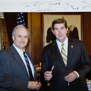 Gov Bob Riley with "The Pen" made from Avondale Mill maple flooring