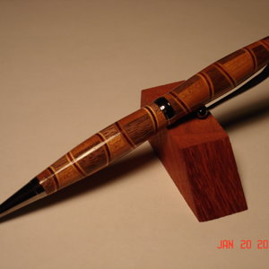 Walnut / Cherry segmented pen with titanium hardware