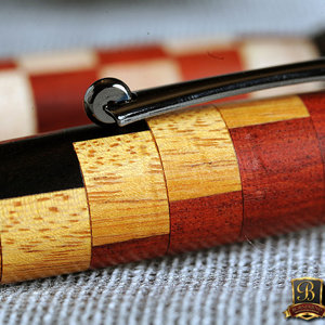 Purple Heart, Osage Orange, and Ebony Segmented Ballpoint