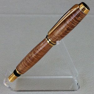 Curly Koa on TiGold Baron