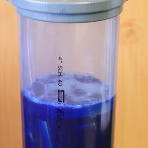 Blue dyed stabilizing resin
