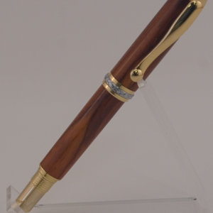 gold triton on cocobolo