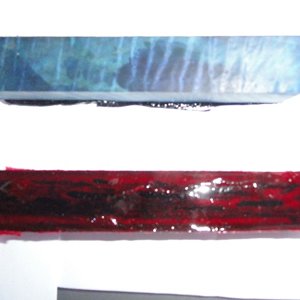 Stabilized blue curly maple and cholla red alumilite.