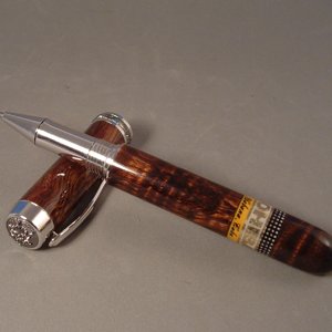 Closed end Statesman rollerball in Curly Koa wood