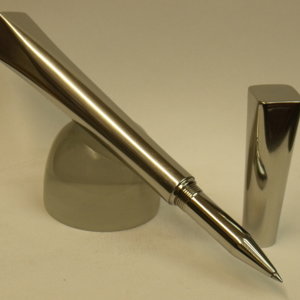 A shiny round square pen