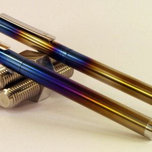 Two flamed pens
