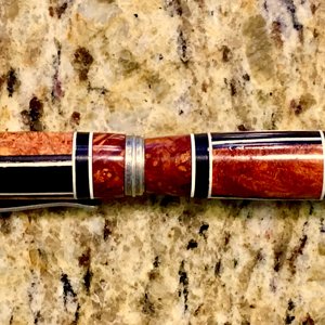 Amboyna burl and ebony