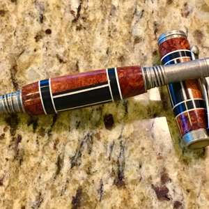 Amboyna burl and ebony