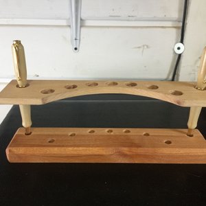 Floating shelf pen stand