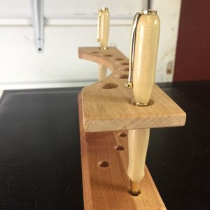 Floating shelf pen stand