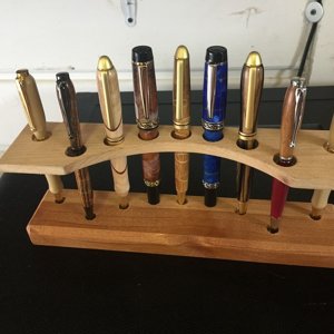 Floating shelf pen stand