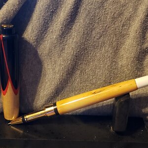 Pool cue rollerball