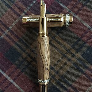 Bethlehem olive wood on Canadiana in gold from William Wood Write