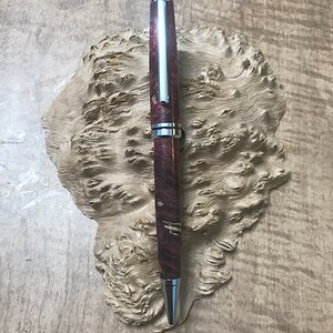 Red Dyed (black & yellow) Buckeye Burl on a Chrome Designer Twist Pen