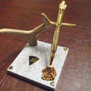 Deer antler, 308 cartridge pen, on Corian Bast