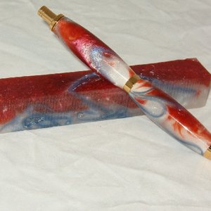 Red & White swirl with blue ribbon