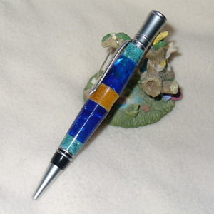 XXX-Blue acrylic, green corian, yellowheart