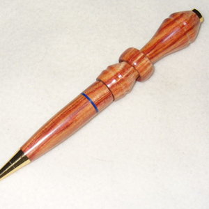 XXX-Captive ring in Tulipwood-XXX