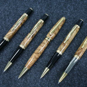 Christmas Pens in Feathered Oak