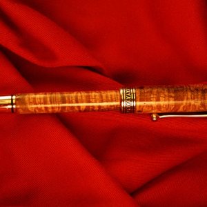 curly koa platinum silver bullet