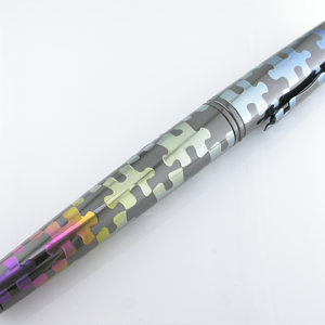 Anodized zirconium puzzle pen