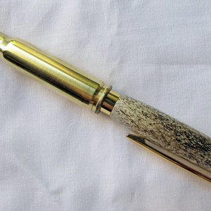 First antler/shell pen