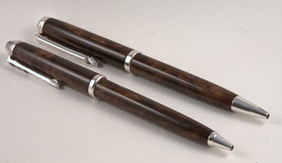 2 walnut and Sterling silver pens