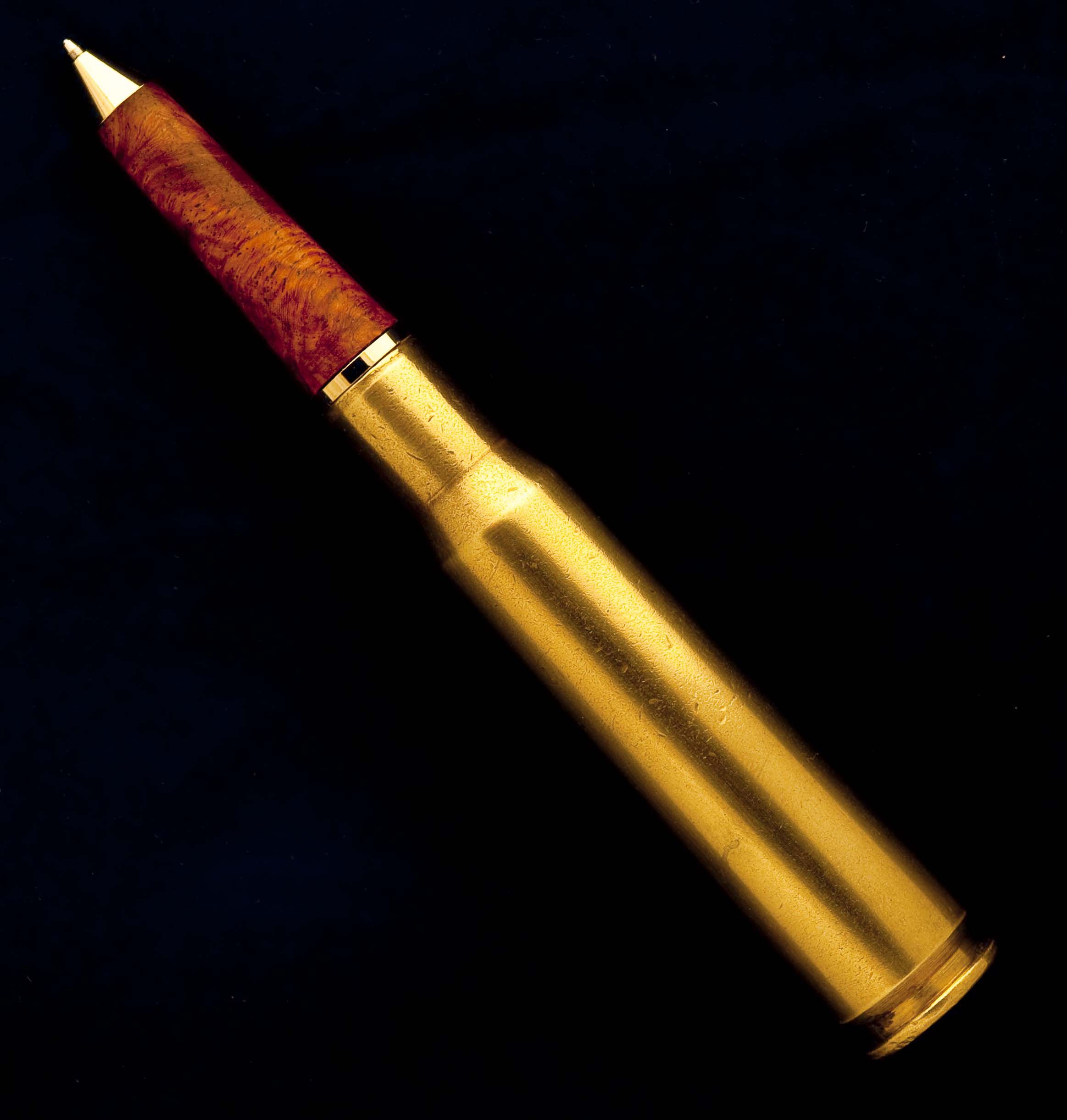 50 caliber cartridge in Amboyna Burl