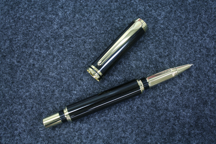 A gold Navigator in Ebony