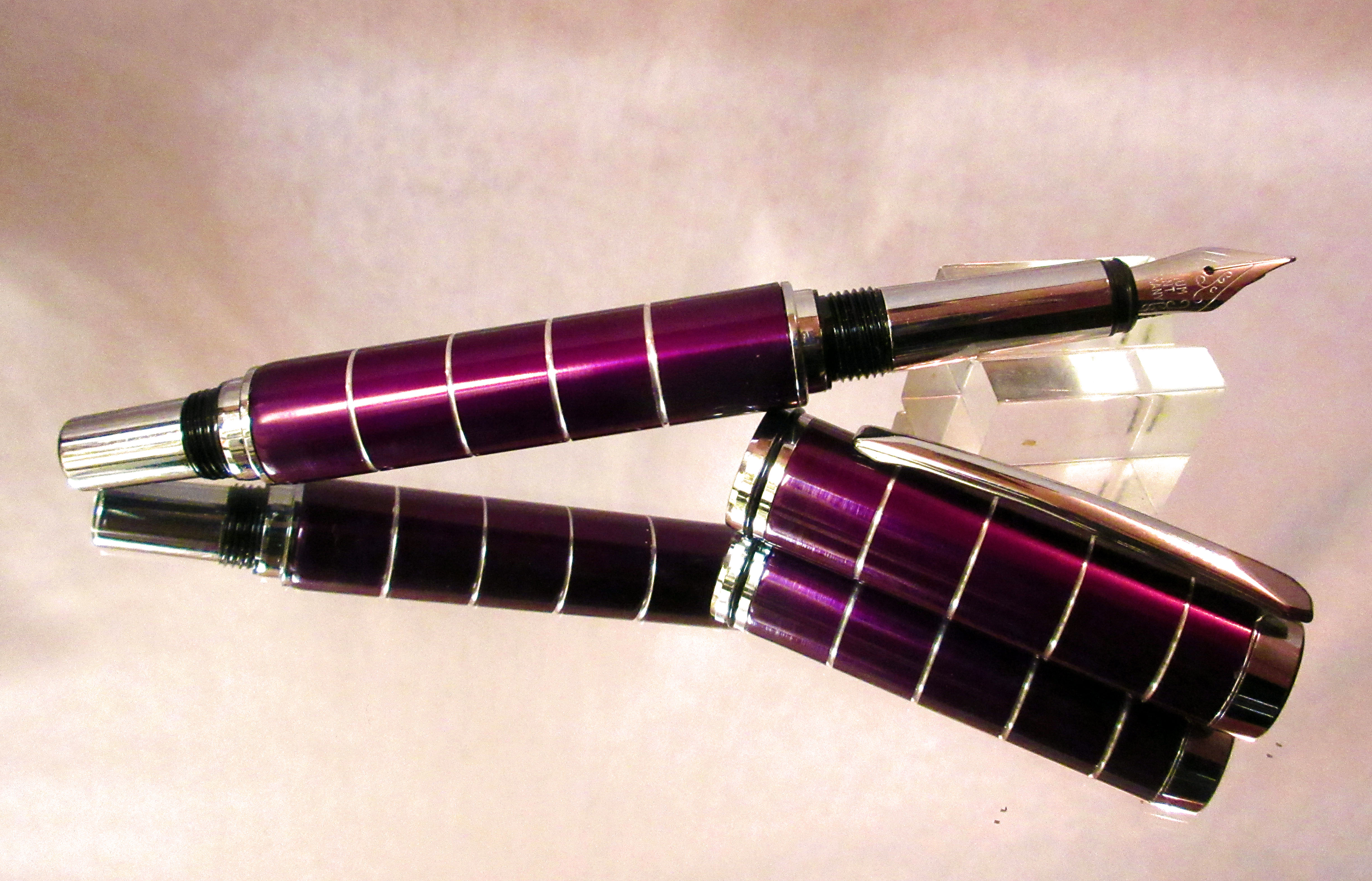 A Purple fountain pen, crafted from aluminium