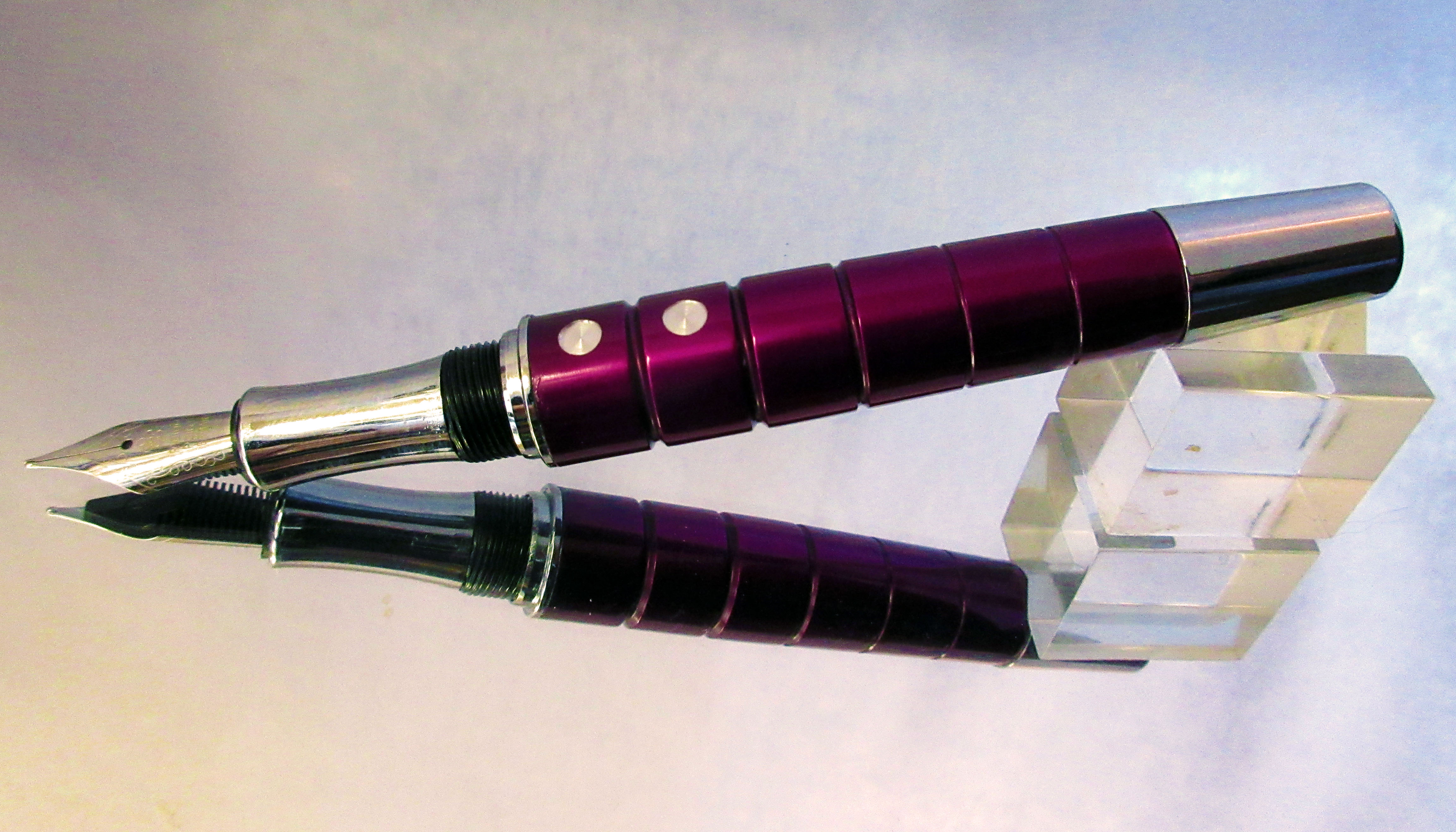 A purple fountain pen crafted from aluminium