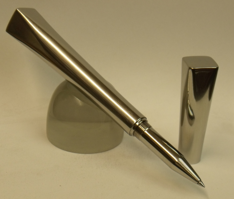 A shiny round square pen