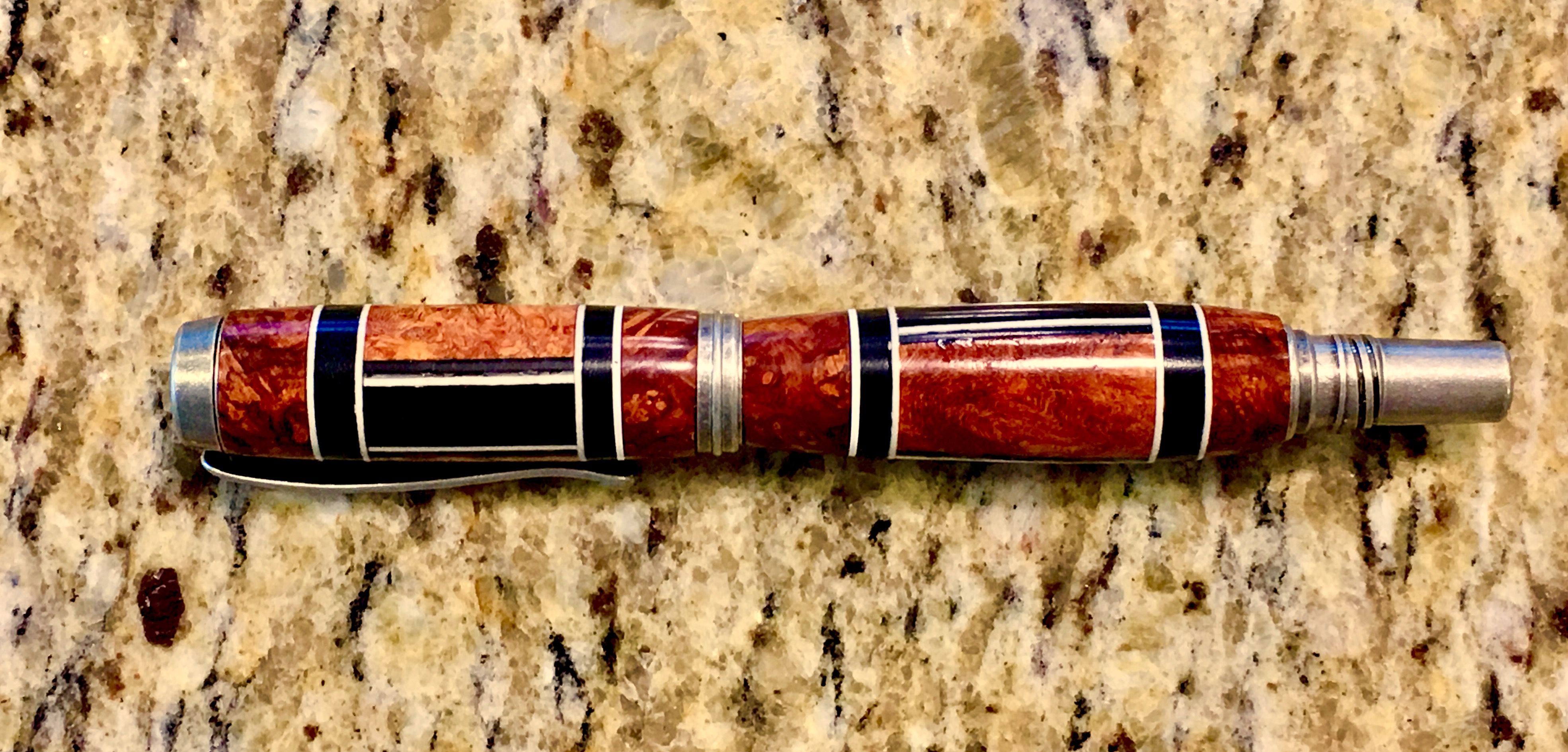 Amboyna burl and ebony