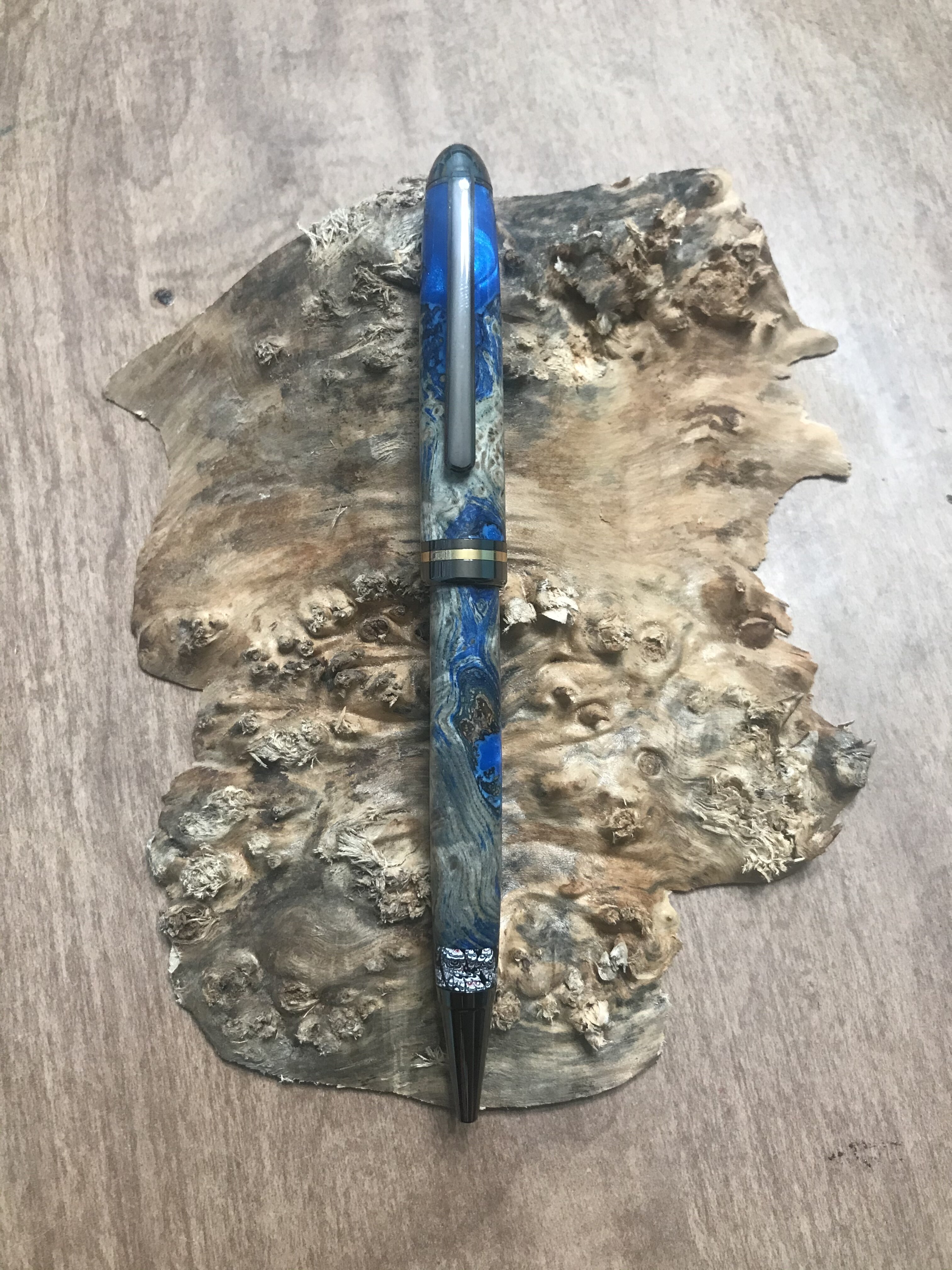 Blue Resin with Dyed Black Ash Burl Hybrid with Fordite tip on a Gun Metal Designer Twist