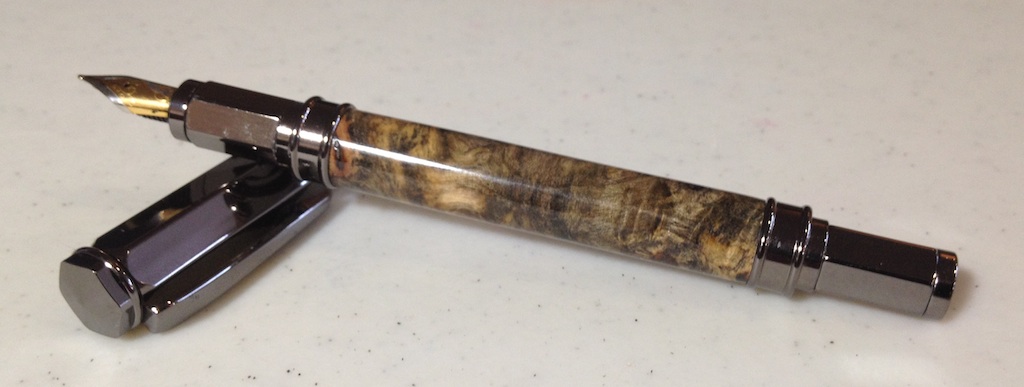 Buckeye Burl on Gunmetal Vertex