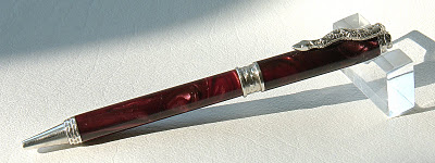 burgundy pr with silver snake