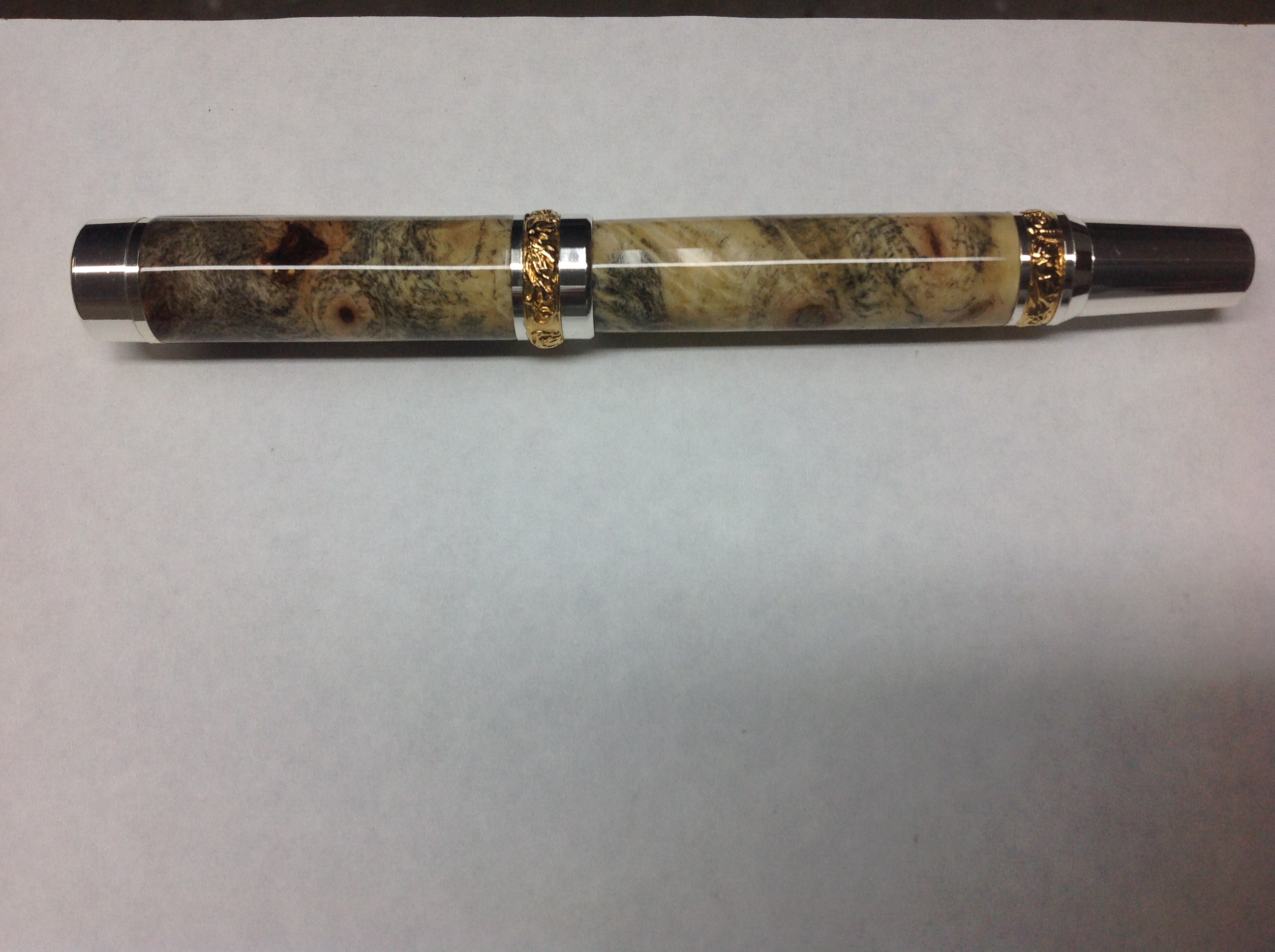 Cambridge hybrid in buckeye burl