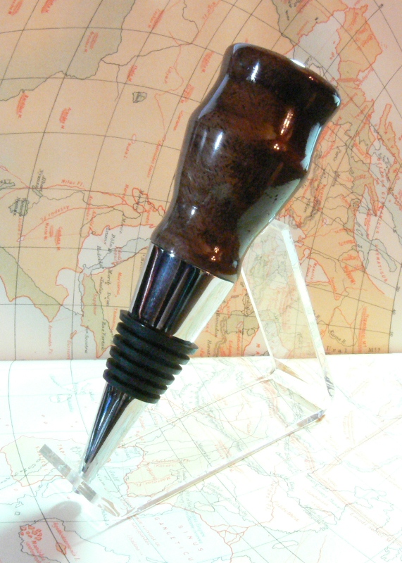 Chrome bottle stopper with walnut