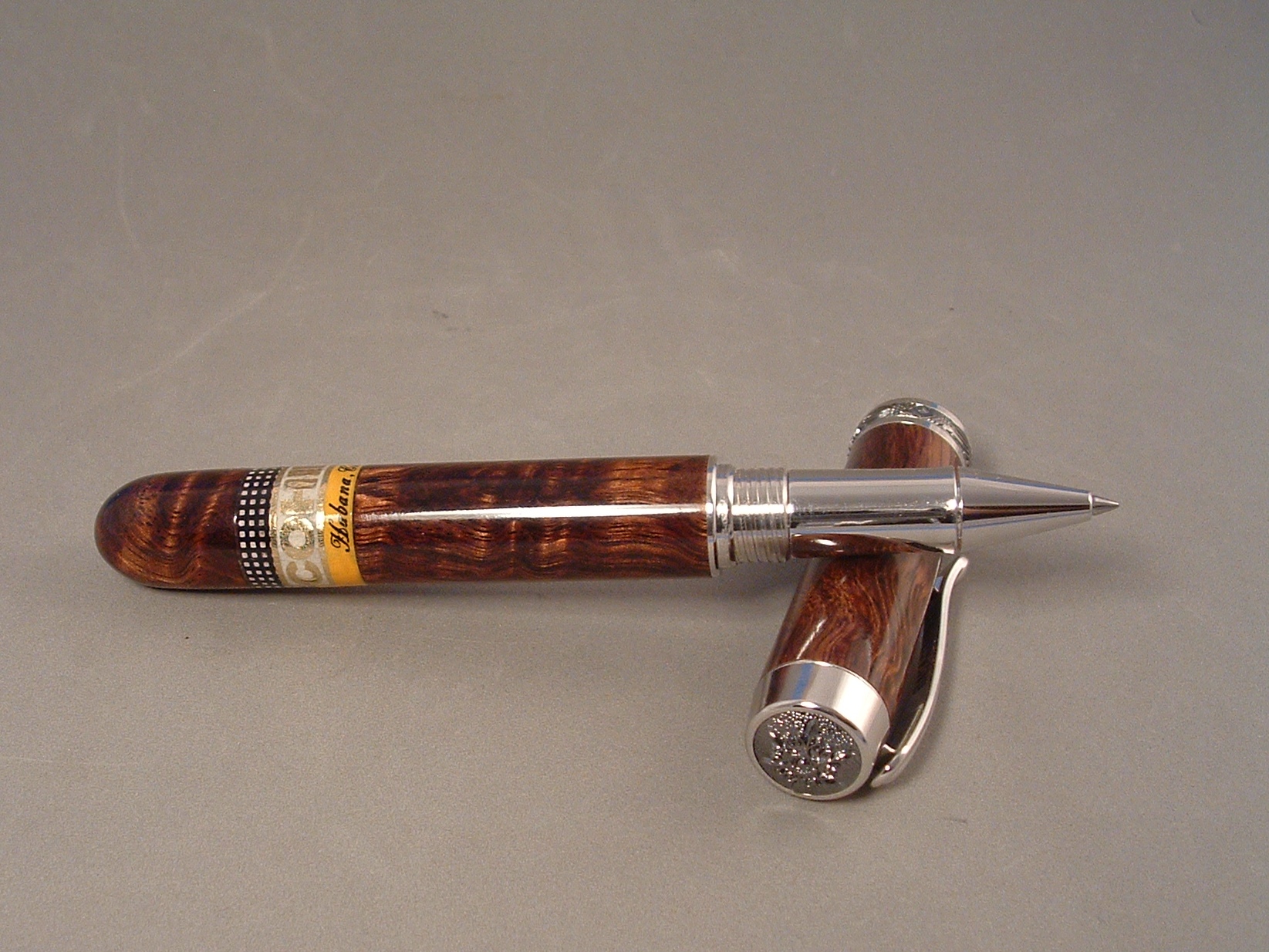 Closed end Statesman rollerball in Curly Koa wood