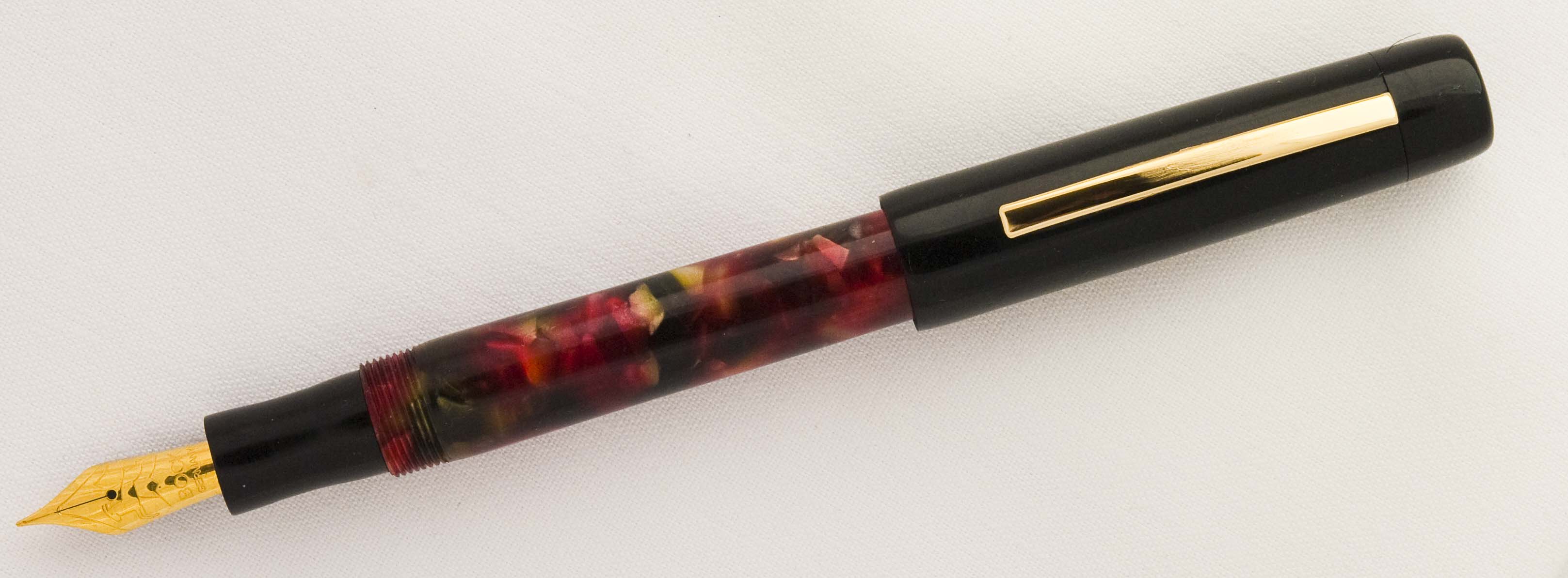 Custom Duo: Ebonite and Red Chunk Resin