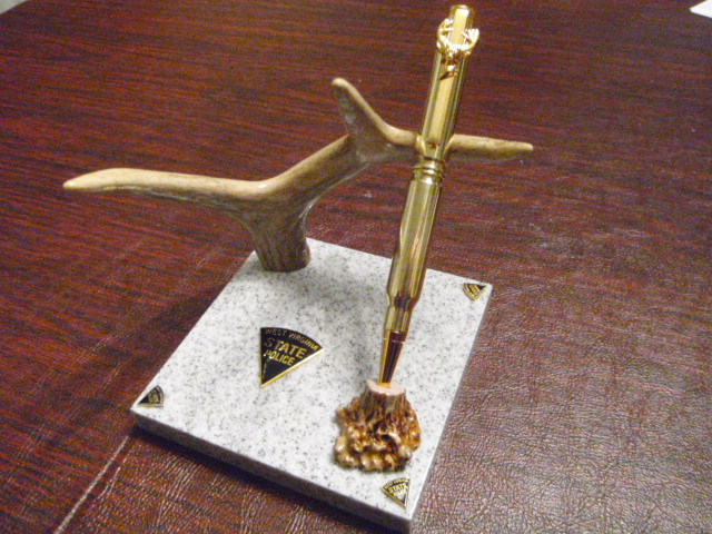 Deer antler, 308 cartridge pen, on Corian Bast