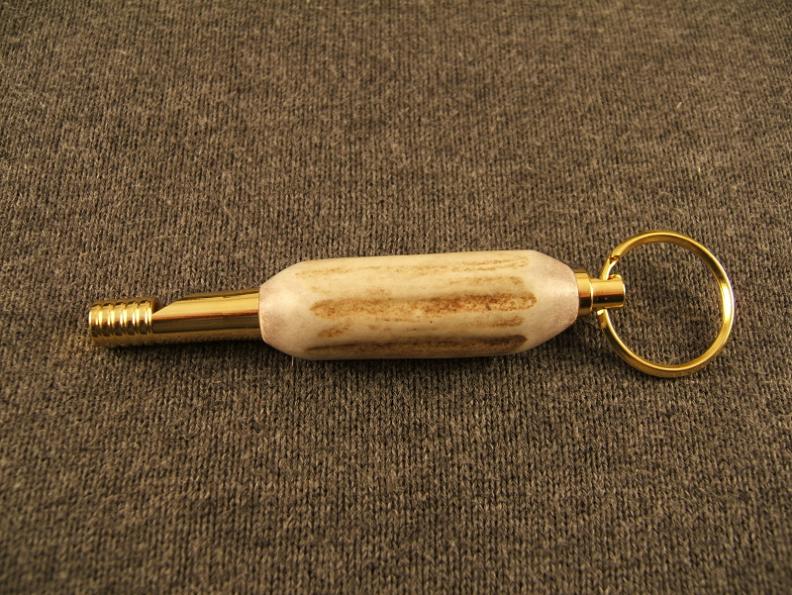 Deer antler whistle.