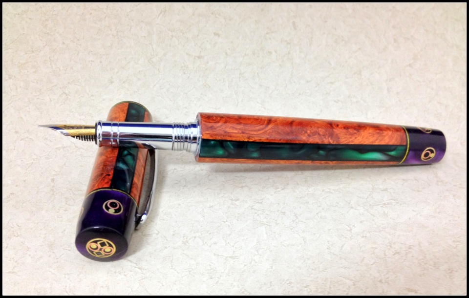 double closed end segmented "Mardi Gras" pen