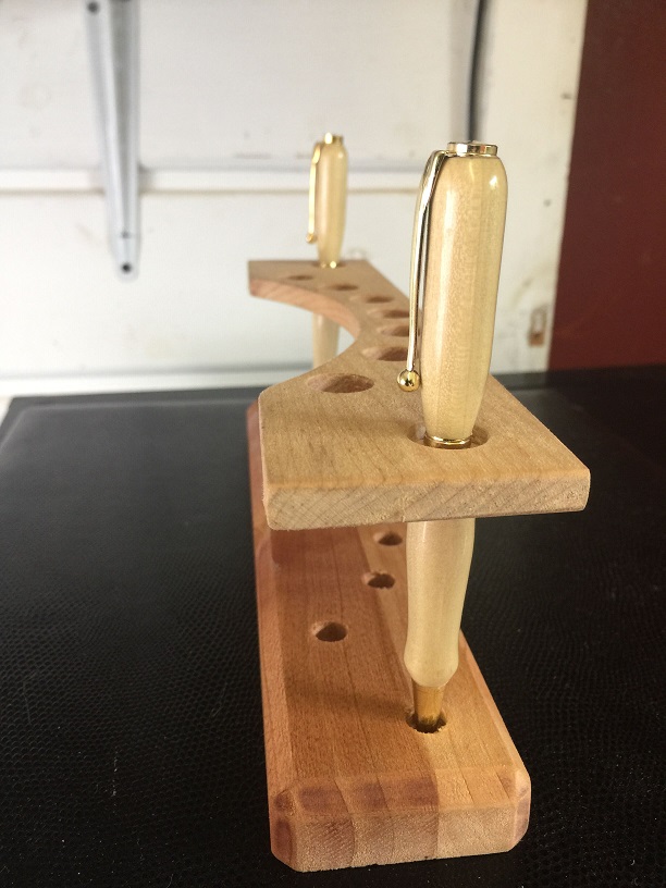 Floating shelf pen stand