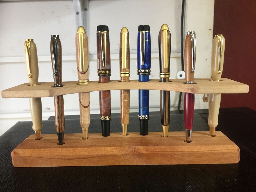 Floating shelf pen stand