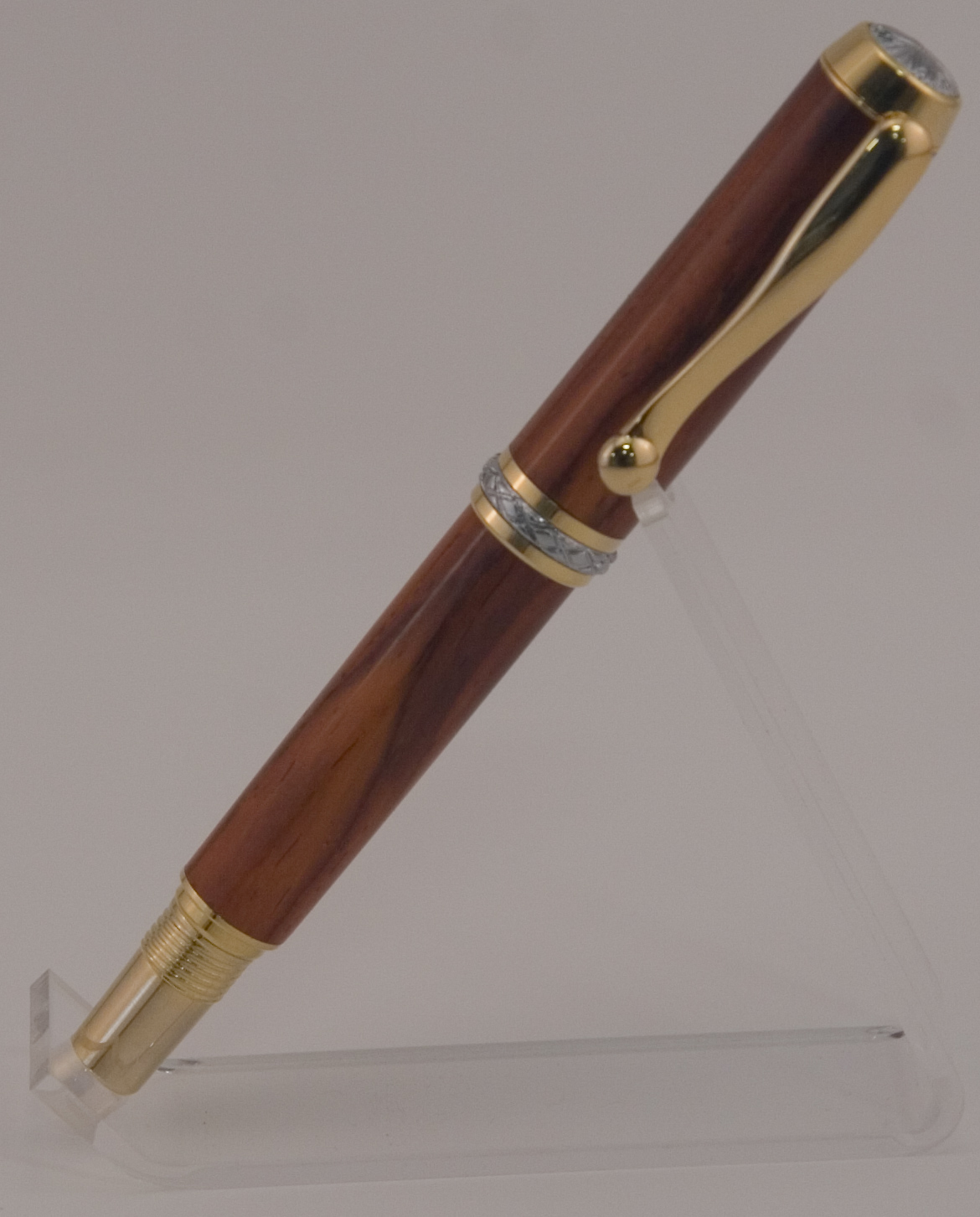 gold triton on cocobolo