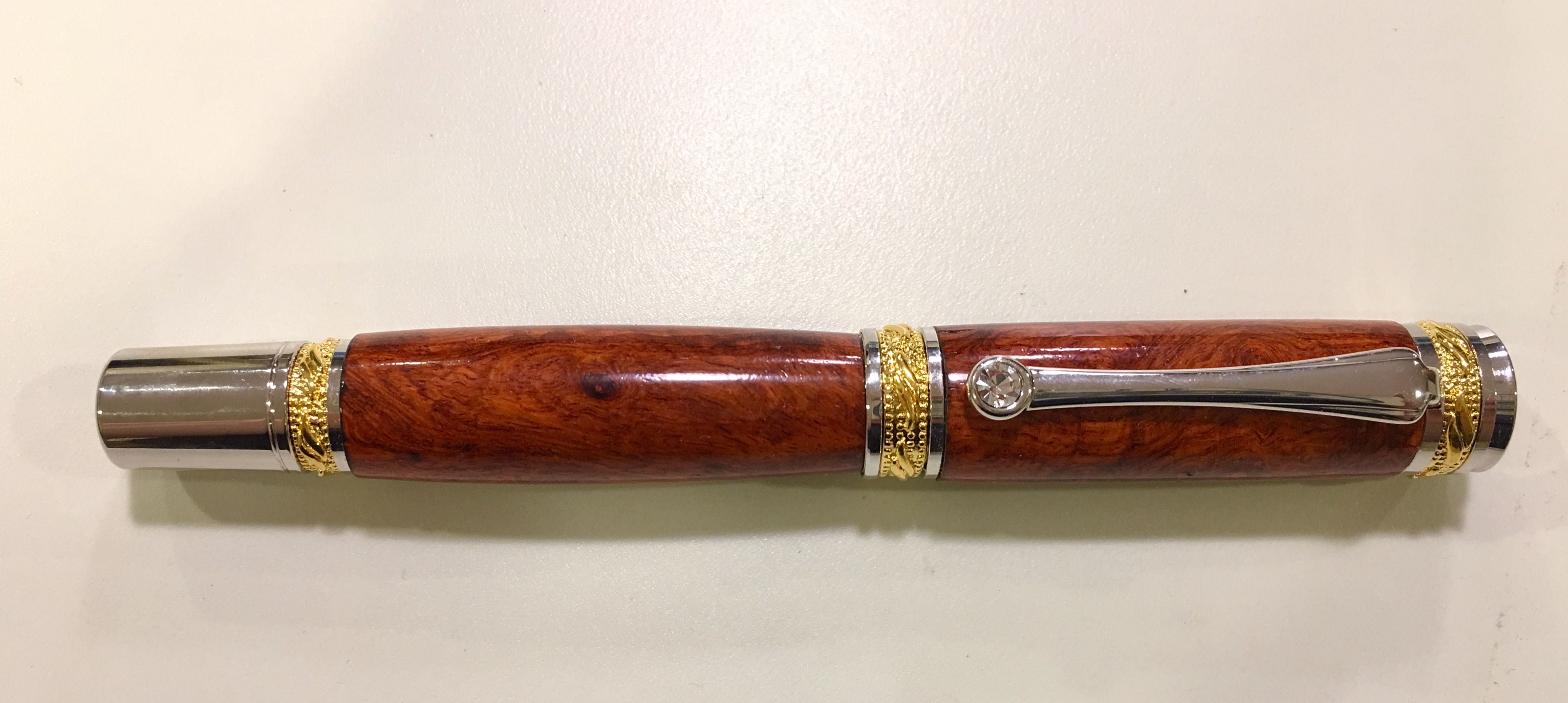 Majestic full sized dressed in amboyna burl